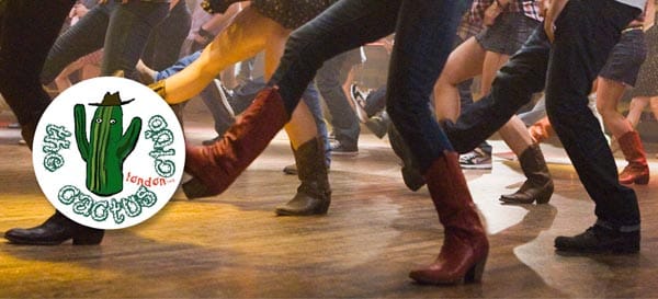 Line dancing at Brighton Pride Pleasure Gardens