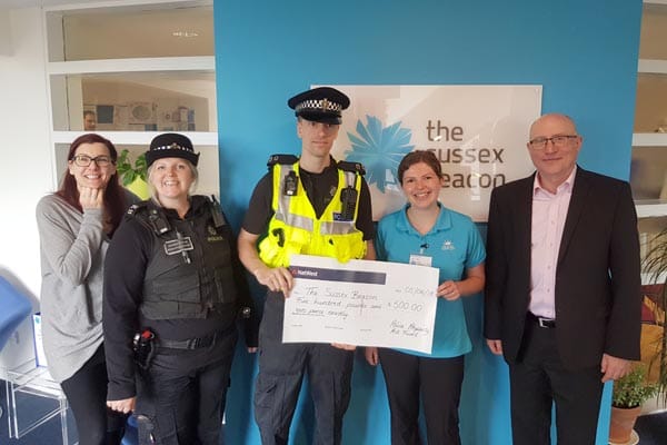 Sussex Police donate £500 to the Sussex Beacon
