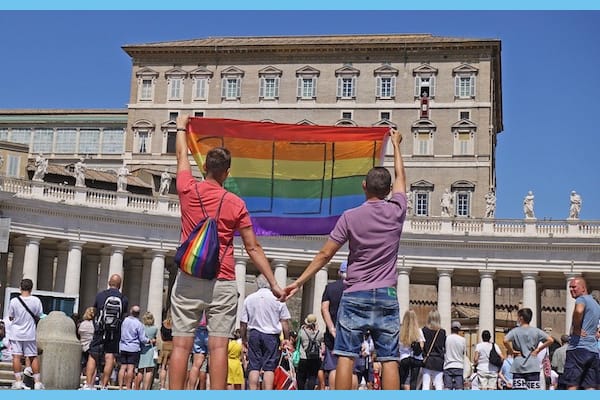 Polish gay couple Jakub and David unfold Rainbow Flag at the Vatican