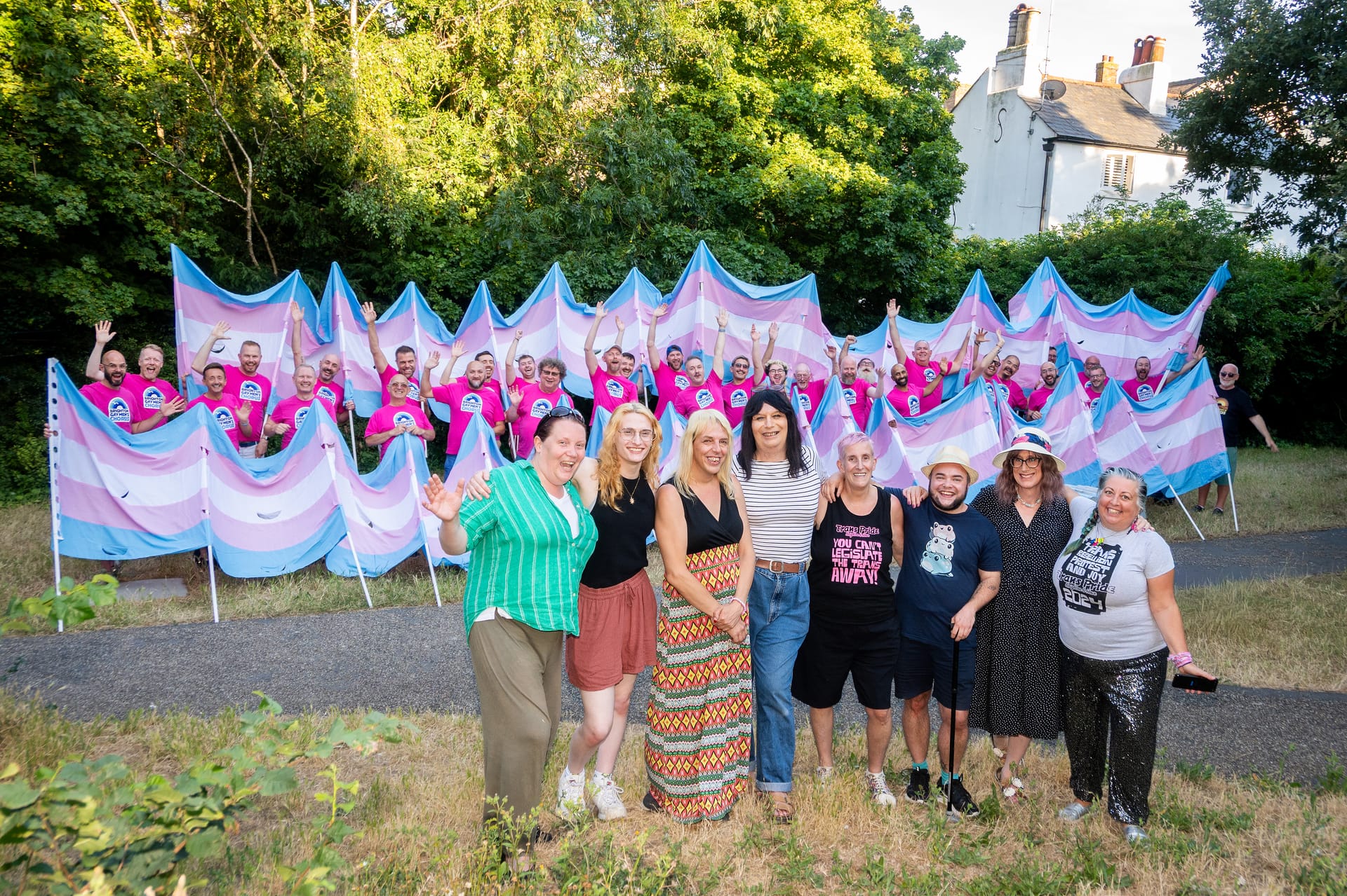 Brighton Gay Men’s Chorus donates 25-metre hand-stitched Trans Flags to Trans Pride Brighton