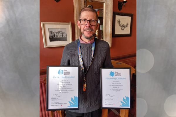 Fundraising Champion: The Sussex Beacon awards The Sussex pub in Hove with certificate after raising over £5,000 for the HIV charity