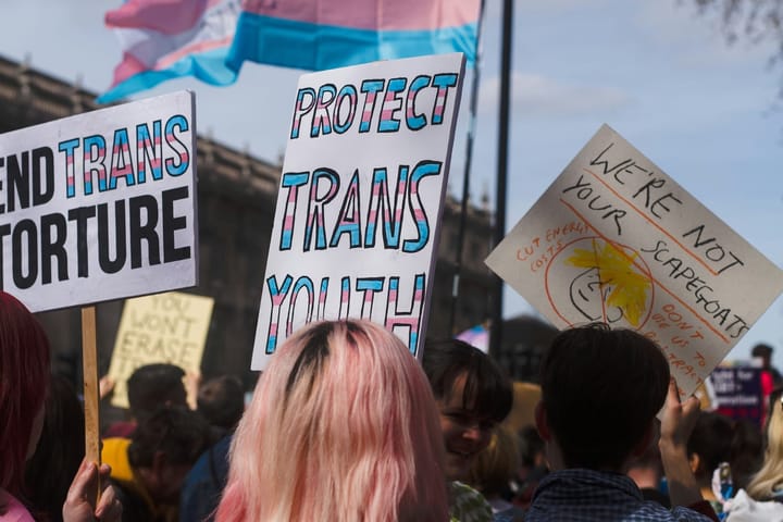 LGBTQ+ activists armed with kazoos blare Chappell Roan to drown out controversial Christian event in Seattle