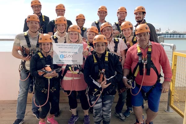 Staff and volunteers raise £1,600 for Sussex Beacon