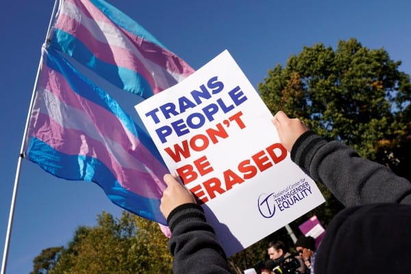 Two men charged with attacking trans women