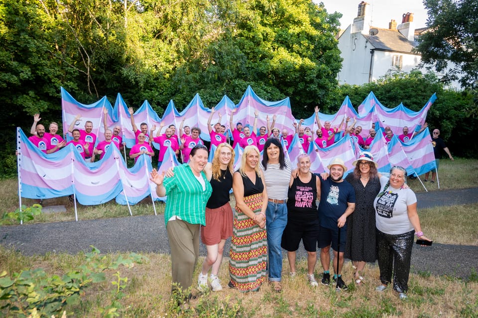 Brighton Gay Men’s Chorus donates 25-metre hand-stitched Trans Flags to Trans Pride Brighton