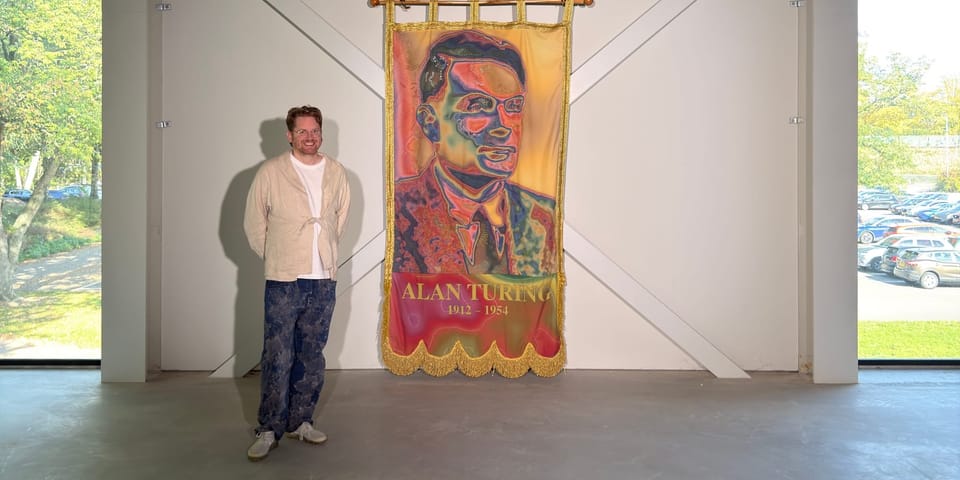 Queer needleworkers stitch Alan Turing banner using his own mathematics