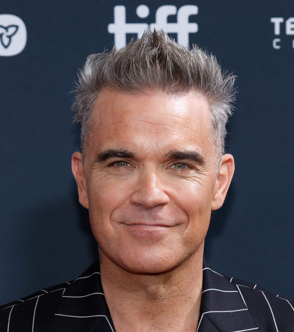 “I’ve done everything but suck a c**k.” Robbie Williams confronts speculation about his sexuality