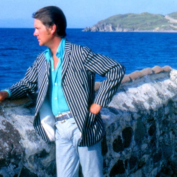 Colin looking over his garden wall at Eftalou,on the island of  Lesbos in the 60s 