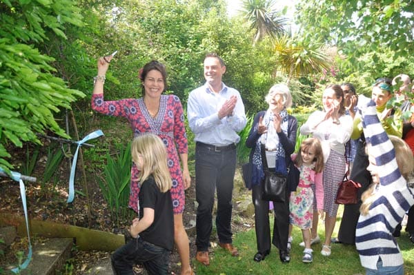 Actress Julie Graham cuts the ribbon to open the Sussex Beacon garden