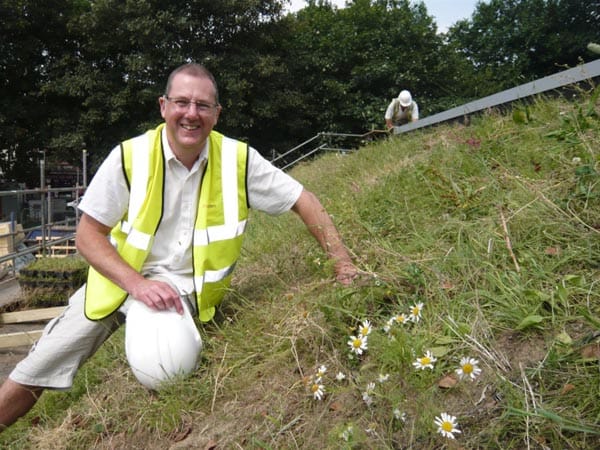 Cllr Pete West on the café’s green roof.
