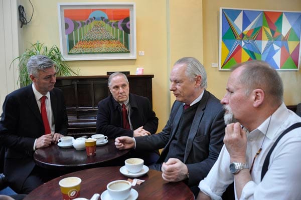 Rt Hon Francis Maude MP listens to concerns of the owner of the Red Roaster Cafe