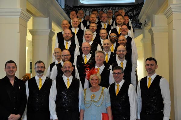 Brighton Gay Men's Chorus with their musical director Marc Yarrow and the Mayor of Brighton & Hove