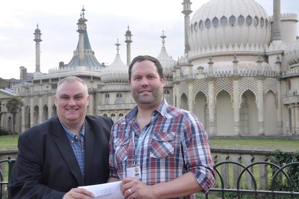 Rainbow Fund Chairman Paul Elgood presents Billie Lewis the Chair of the Brighton & Hove LGBT Community Safety Forum, with a £3,000 grant to facilitate deaf intrepreters at Brighton Pride, 2014