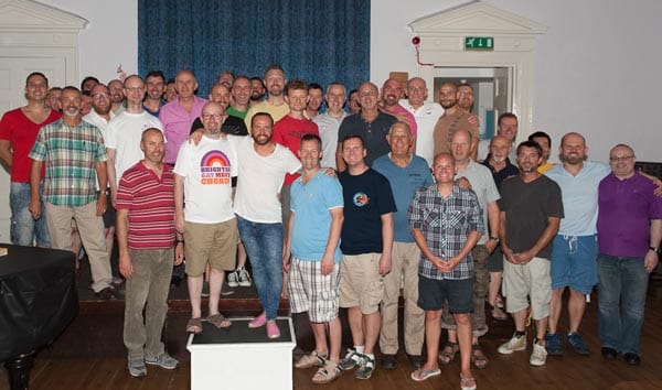 Members of Brighton Gay Men’s Chorus with Gogglebox’s Christopher Steed