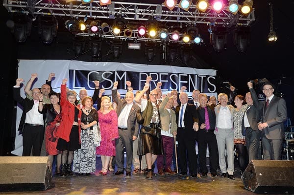 LGSM members pictured in 2014, including Mike Jackson far left with the pink bow tie.