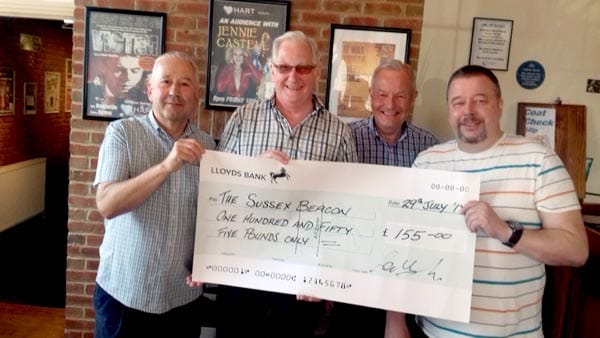 Pictured –  Derek, Ken and Chris from Eastbourne Rainbow and Andrew from the Hart with Sussex Beacon cheque.