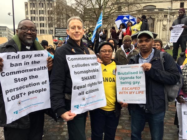 Peter Tatchell with Rev Jide Macaulay (left), Hamimah Minah and Edwin Sesange (right) of Uganda.