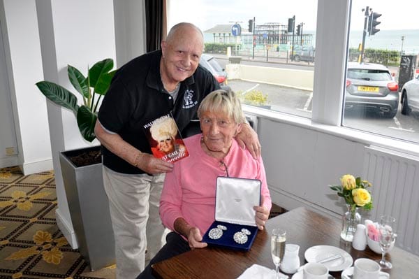 Walter presents David with a pair of diamond earrings